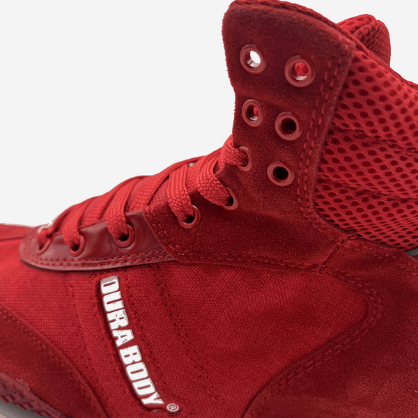close up of the side showing the laces of the  Red Pro Level 2 Series sneakers 