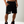 Load image into Gallery viewer, right side of black shorts, that has a zipper 
