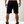 Load image into Gallery viewer, back of black shorts, that has a zipper 
