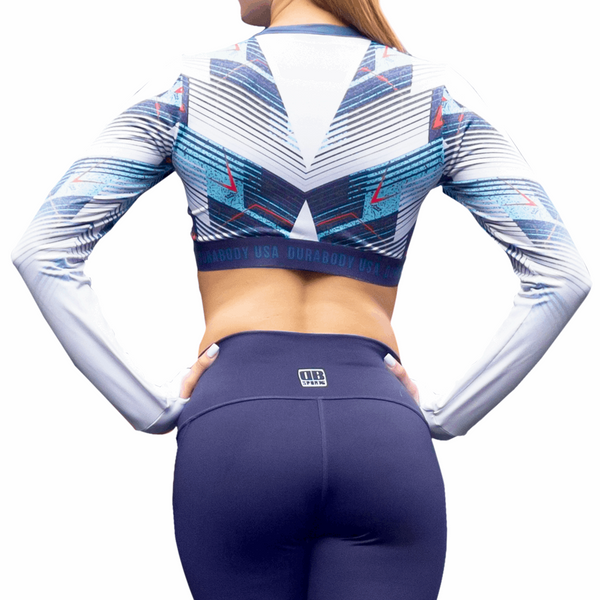back of blue and white long sleeve crop top, with company name on the bottom 