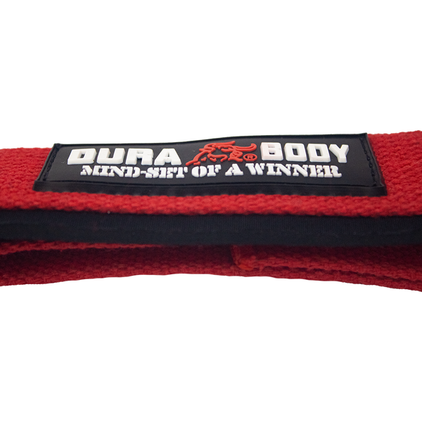 A Pair of Red Lifting Straps showing the padding 