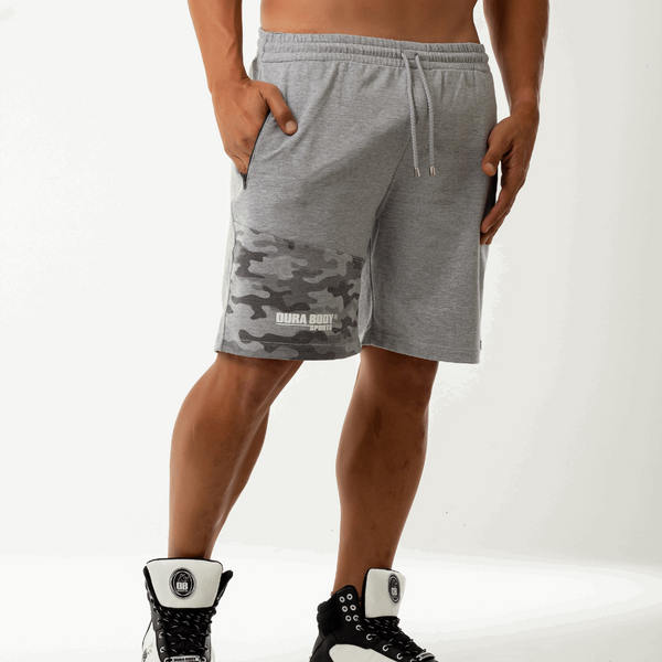 front side of Athletic Grey Shorts, with hand in pocket 