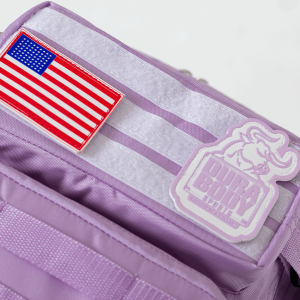 front top of the velcro pocket of the light purple military bag 