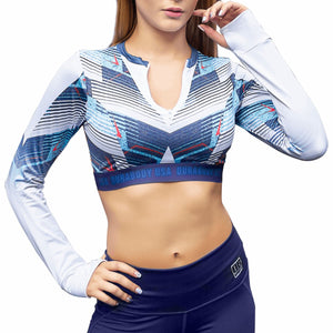 Front of blue and white, long sleeve crop top. with company name on the bottoms 