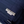 Load image into Gallery viewer, bottom right of the navy blue military bag, that shows logo 
